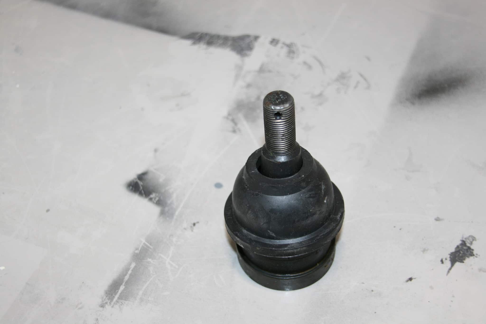 A new Suspension Ball Joint with a damaged split Grease Boat